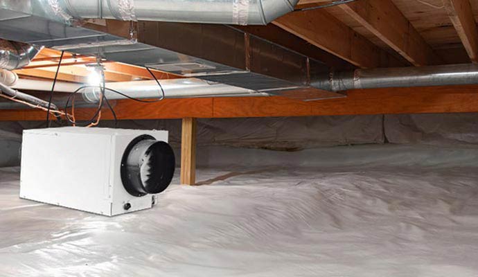 Dehumidifier installed in a crawlspace