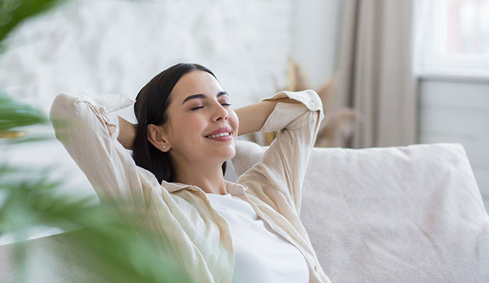 Woman relaxing on sofa